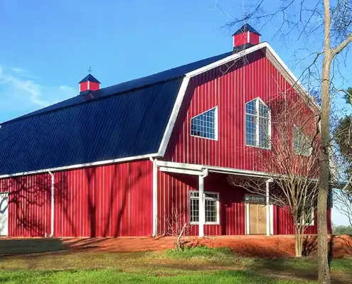 Large clear-span agricultural steel building with sliding doors