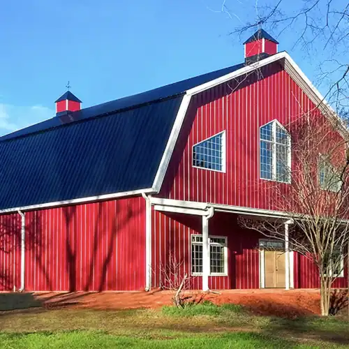 Large clear-span agricultural steel building with sliding doors